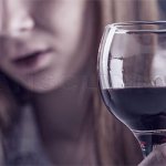 Girl suffering from alcohol addiction