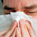 A man has a runny nose