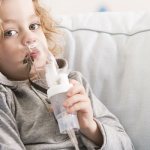 Child doing inhalation