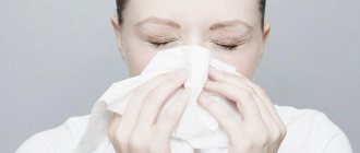 woman sneezes